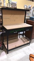 Workshop tool bench with the pegboard back with