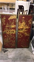 Pair of painted oriental panels with decorative