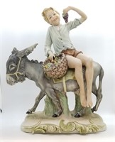 Large Capodimonte Pucci Boy Riding Donkey Figure