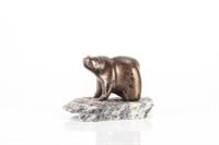 Carved stone figural sculpture of a bear