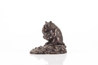 Bronze sculpture of a black bear
