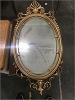 Unique gold framed mirror