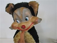 Vintage plastic face skunk stuffed animal