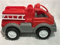 Child’s  red plastic firetruck.