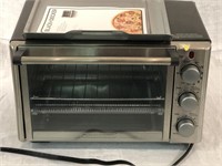Black & Decker toaster oven. Open box. Powers on.