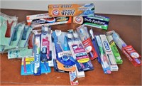 Large Lot of Unopened Toothpaste & Toothbrushes