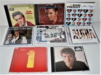 9 CDs Featuring Elvis and The Beatles