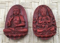 Pair of Red Carved Pendants