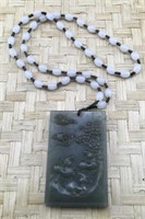 Carved Green Pendant on White Beaded Necklace