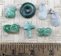7 Very Small Carved Green Pendants