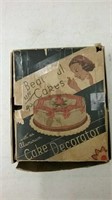 Cake decorator in vintage box