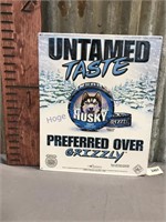 Husky Untamed Taste tin sign