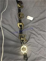 Leather strap w/ 4 large metal charms