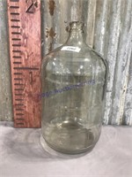 Glass water bottle, 19 inches tall