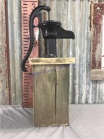 Hand pump (14") on wood stand (17.5")