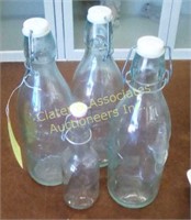 Four collectable milk bottle