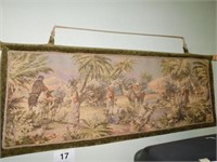 Hanging tapestry of watering hole scene of