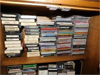 Contents of cabinet, cassettes & CDs, some 8