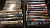 32 Vintage VHS movie variety.