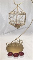 Gold metal birdcage tea light holder with 4 red