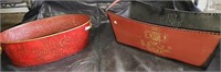 Pair of red metal backyard urns