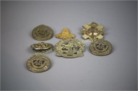 LOT OF SEVEN MILITARY BADGES