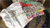 Old quilt patches and embroidery coverlet