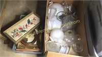 Box of lamp globes and wall art