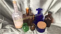 7 old bottles and jars