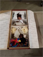 Precious heirloom doll with a few beanie baby