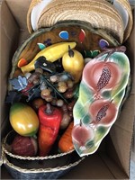 Box of fruit bowl and fake fruit