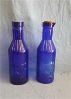 (2) Cobalt blue milk bottles