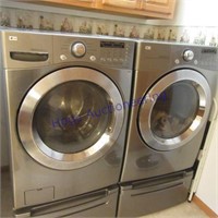 LG Front load washer & electric dry on stand