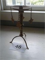 Cast iron candle stand