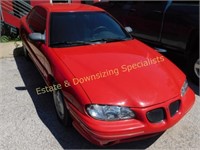 1996 Red Pontiac Grand Am SE
