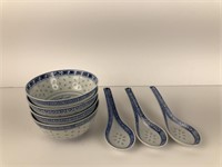 Set of porcelain bowls with spoons
