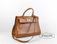Brown leather purse by Sabatier France