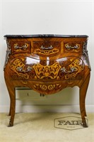 Decorative commode with a marble top