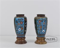Pair of small oriental themed vases