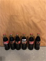 Lot of 6 Christmas Coca Cola glass bottles