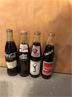 Lot of 4 vintage coca cola bottles
