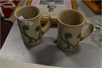 Signed pottery mugs