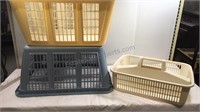 Two Rubbermaid laundry baskets and Super Caddy