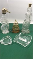 Three glass Avon bottles and two vintage clear