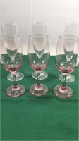 Six fluted wine glasses