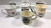 Variety of mugs: pocket mugs, lidded cat mug ,