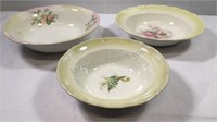 Three ceramic bowls with floral pattern