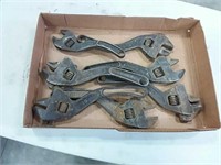 assortment of antique wrenches