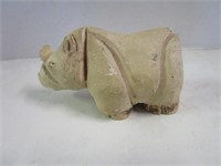 Neat carved rhino figurine; feels like stone