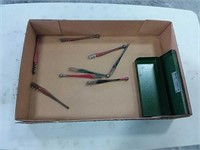 Assortment of glass cutters, tool box